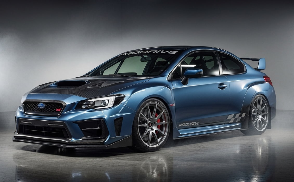 A Prodrive P25 with the Prodrive Performance Pack, street-legal Subaru WRX, parked in a smoky garage, showcasing carbon fiber panels, metallic blue paint, and wide alloy wheels under dramatic cinematic lighting, captured in a wide-angle perspective.